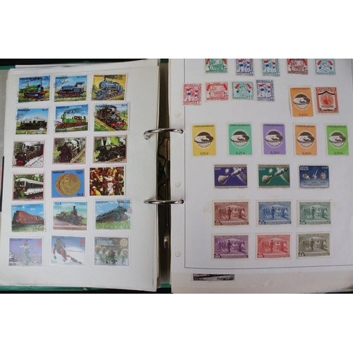 423 - A large collection of mainly world stamps mounted to sheets and contained within nine binders.