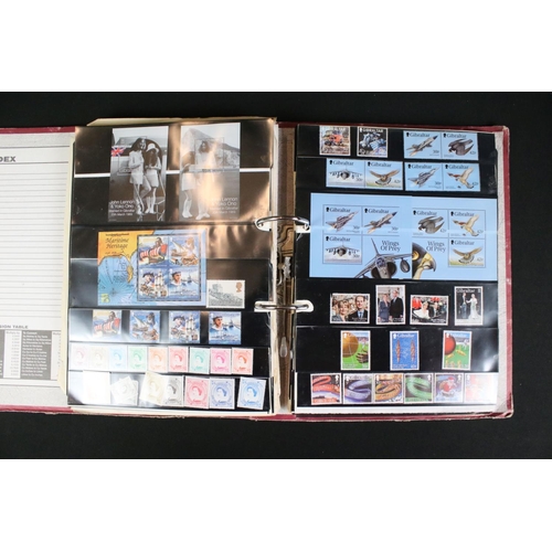 423 - A large collection of mainly world stamps mounted to sheets and contained within nine binders.