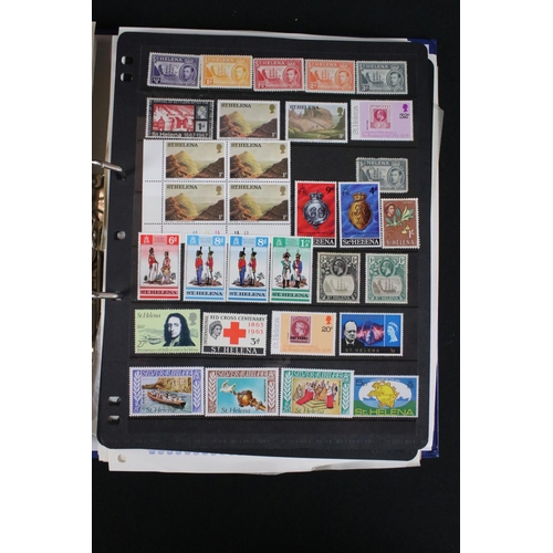 423 - A large collection of mainly world stamps mounted to sheets and contained within nine binders.