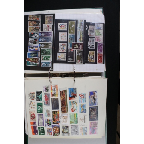 423 - A large collection of mainly world stamps mounted to sheets and contained within nine binders.