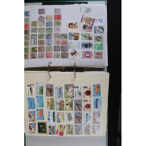 423 - A large collection of mainly world stamps mounted to sheets and contained within nine binders.