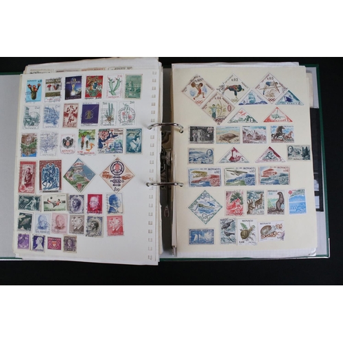 423 - A large collection of mainly world stamps mounted to sheets and contained within nine binders.