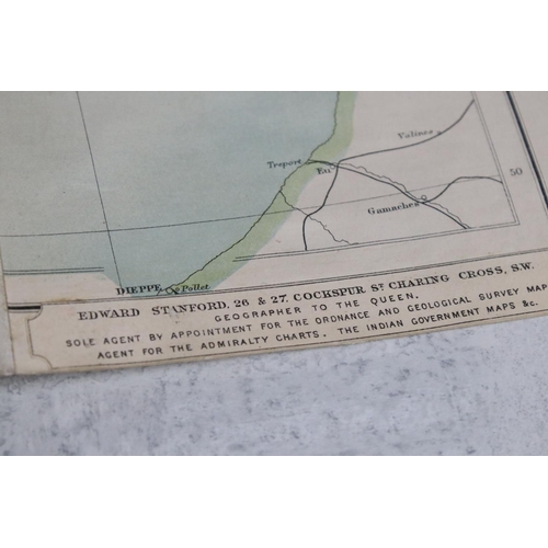 427 - An antique Edward Stanford Ordnance survey map of England and Wales in two sections and mounted to c... 