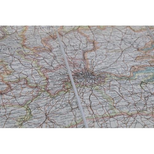 427 - An antique Edward Stanford Ordnance survey map of England and Wales in two sections and mounted to c... 