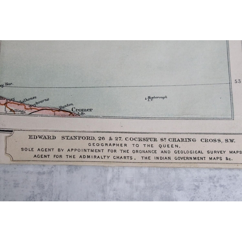 427 - An antique Edward Stanford Ordnance survey map of England and Wales in two sections and mounted to c... 