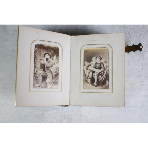 429 - An antique Carte De Visite photograph albums together with contents.