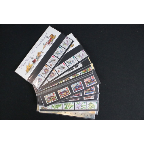 433 - A large collection of Royal Mail presentation packs together with other mint stamps.