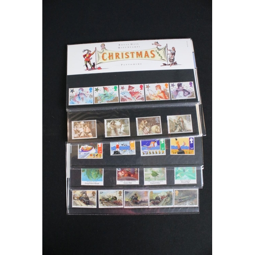 433 - A large collection of Royal Mail presentation packs together with other mint stamps.