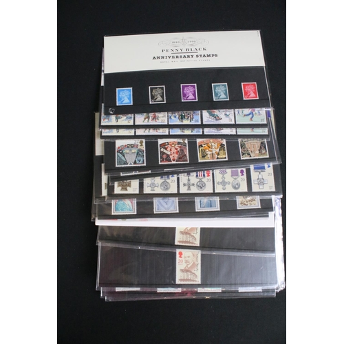 433 - A large collection of Royal Mail presentation packs together with other mint stamps.