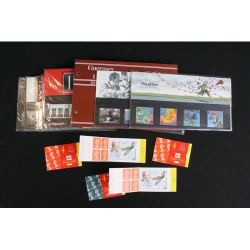 433 - A large collection of Royal Mail presentation packs together with other mint stamps.