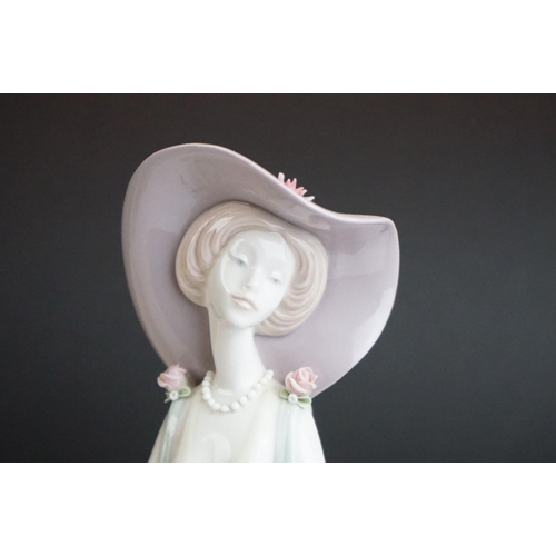 11 - Lladro ' Afternoon Tea ' porcelain lady figure, no. 1428 (35.5cm high), together with a Lladro Balle... 