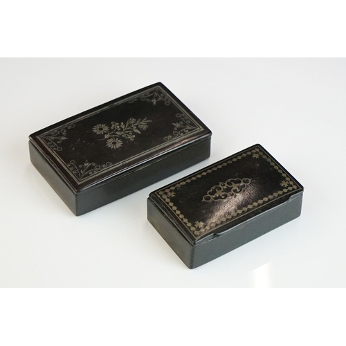 212 - Two 19th century Black Lacquered Papier Mache Snuff Boxes with pewter inlay, largest 8.5cm long