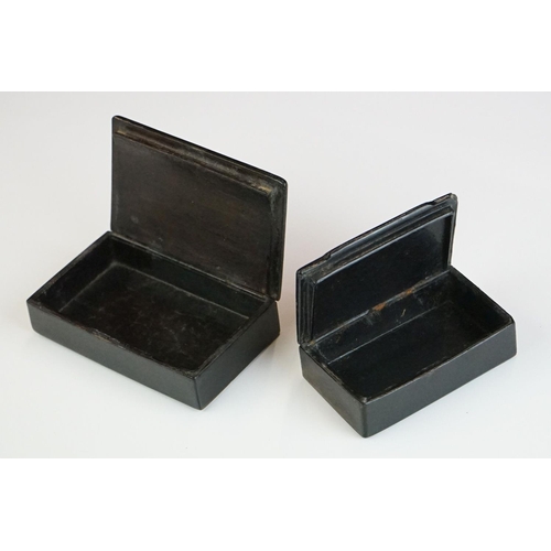 212 - Two 19th century Black Lacquered Papier Mache Snuff Boxes with pewter inlay, largest 8.5cm long