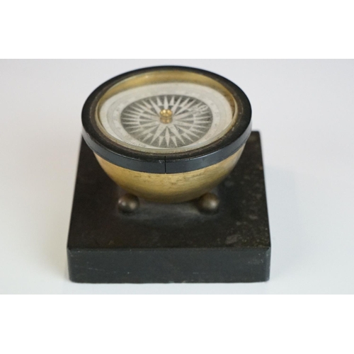 214 - An early 20th century desktop compass.