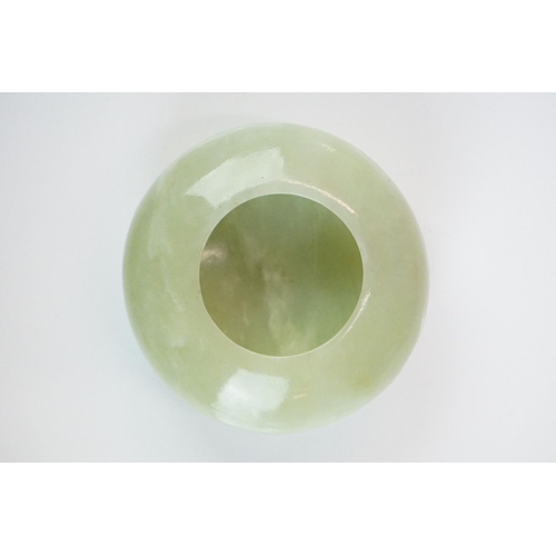 217A - Chinese Jade Brush Washer of compressed circular form on a slightly raised base, 6.5cm diameter x 3c... 