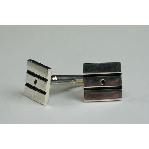 234 - Two pairs of contemporary fully hallmarked sterling silver cufflinks.