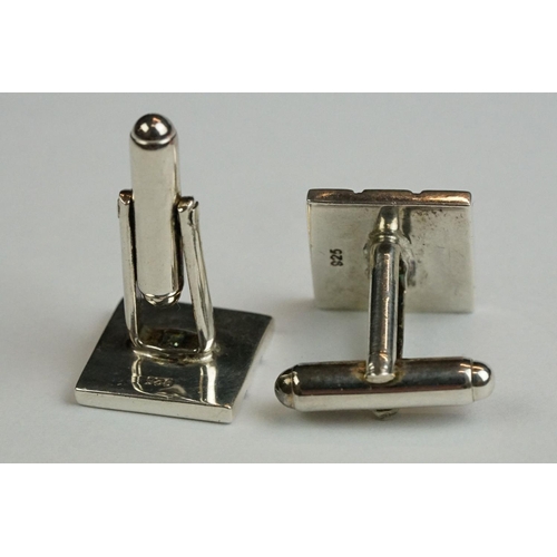 234 - Two pairs of contemporary fully hallmarked sterling silver cufflinks.