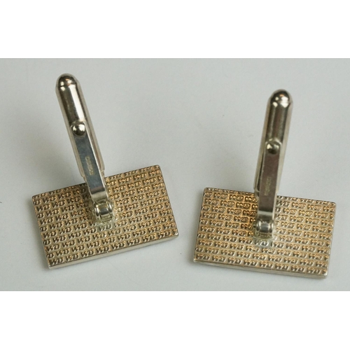 234 - Two pairs of contemporary fully hallmarked sterling silver cufflinks.