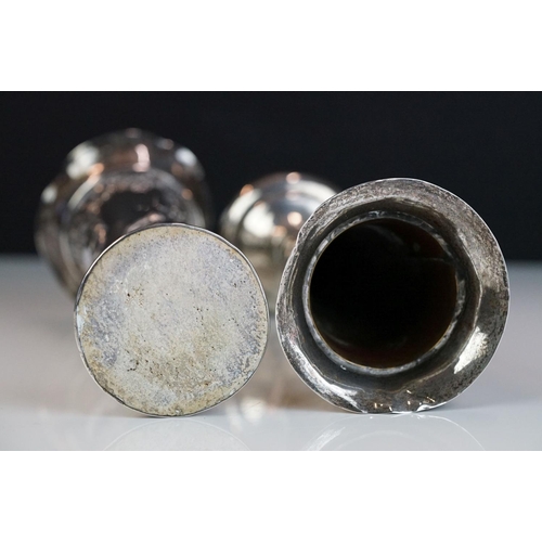 246 - A pair of fully hallmarked sterling silver bud vases together with a white metal cigarette case.