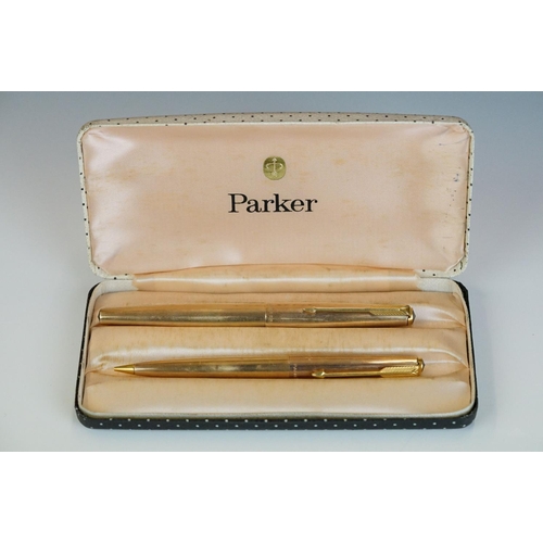 247 - A pair of Rolled Gold Parker pens within original gift case together with a Sheaffer example and two... 