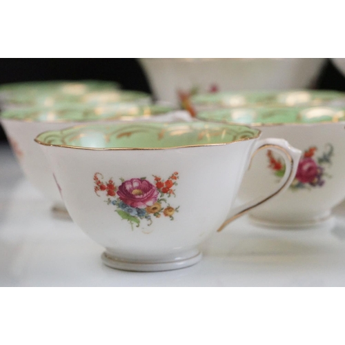 29 - Early 20th Century English porcelain floral tea set in pale green & white with gilt detailing, patte... 