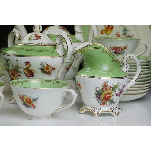 29 - Early 20th Century English porcelain floral tea set in pale green & white with gilt detailing, patte... 