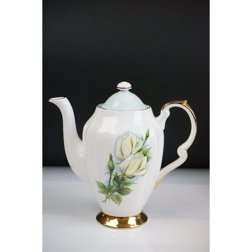 75 - Paragon ' Six World Famous Roses ' tea and coffee ware to include coffee pot & cover, 6 teacups, 8 s... 