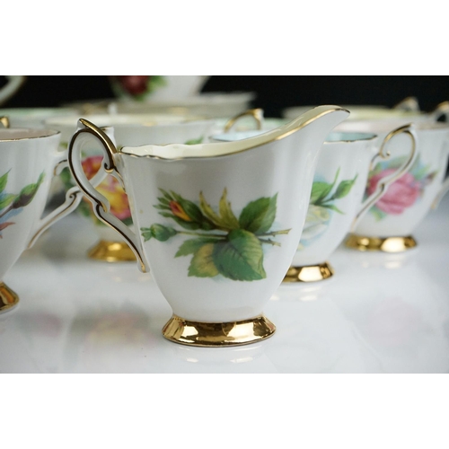 75 - Paragon ' Six World Famous Roses ' tea and coffee ware to include coffee pot & cover, 6 teacups, 8 s... 