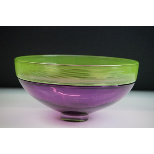 34 - Bob Crooks - Two threaded studio glass bowls to include a lime green & aubergine example, with a fin... 