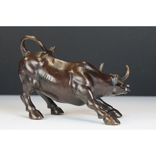 267 - A Bronze ornament of the Wall Street Bull, stands approx 85mm in height.