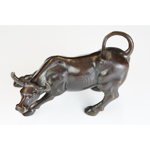 267 - A Bronze ornament of the Wall Street Bull, stands approx 85mm in height.