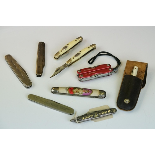 259 - A small collection of pocket penknives to include sterling silver examples together with a Leatherma... 