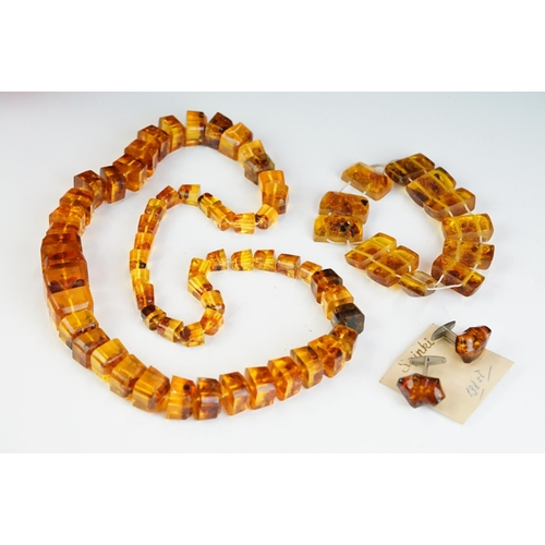 260 - An amber style beaded necklace and bracelet together with similar earrings.