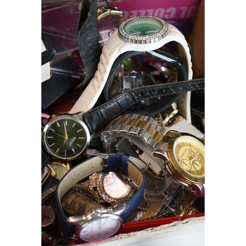 284 - A large collection of ladies and gents wristwatches to include Timex, Lorus, Citizen...etc.