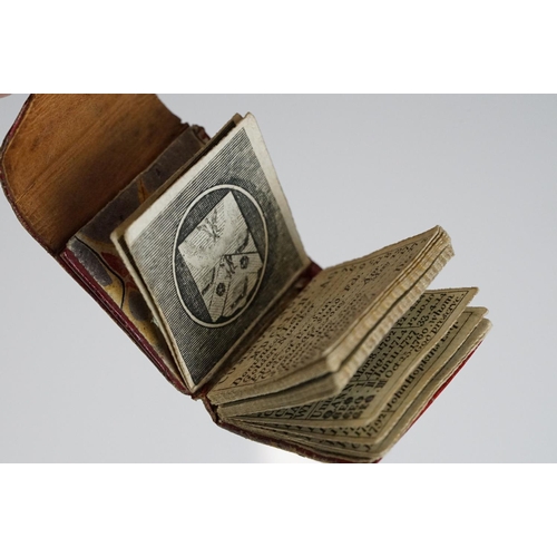 278 - A small group of mixed collectables to include wax seals, miniature leather bound book and miniature... 