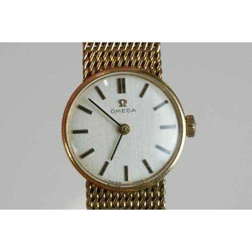 280 - A ladies Omega gold cased watch with hallmarked gold strap together with a gold cased ladies Tissot ... 