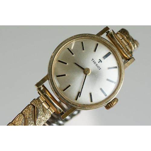 280 - A ladies Omega gold cased watch with hallmarked gold strap together with a gold cased ladies Tissot ... 