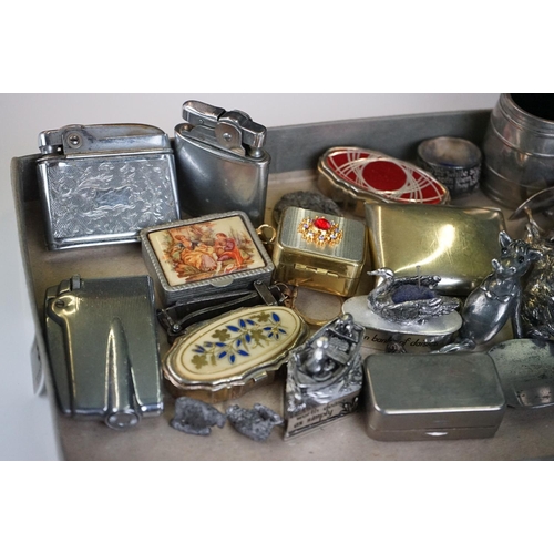 288 - A group of mixed collectables to include pocket lighters, money box, pill boxes, silver handled shoe... 