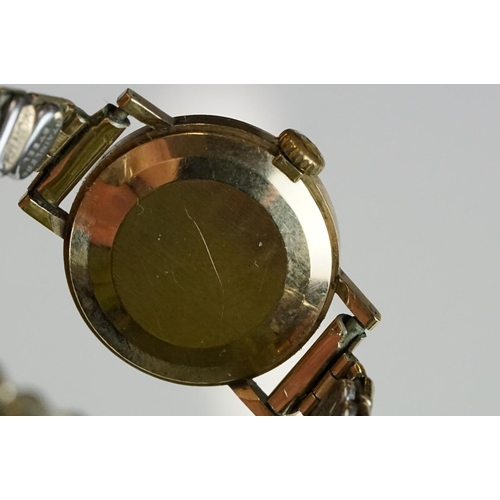 280 - A ladies Omega gold cased watch with hallmarked gold strap together with a gold cased ladies Tissot ... 