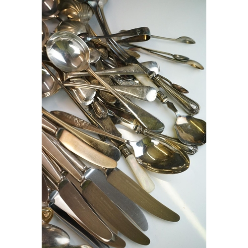 290 - A collection of mainly silver plated cutlery / flatware to include some with hallmarked silver handl... 