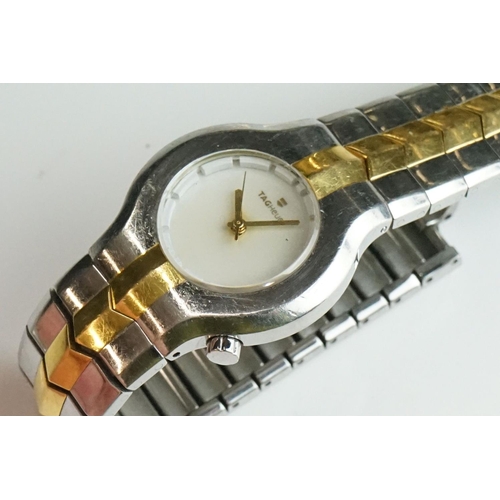 282 - A collection of gents and ladies wristwatches to include Citizen and Swatch examples.