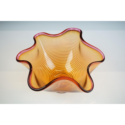 43 - Bob Crooks - Two ' Venetian ' glass bowls of lobed form, to include an amber example with ruby threa... 