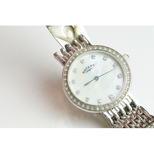 282 - A collection of gents and ladies wristwatches to include Citizen and Swatch examples.