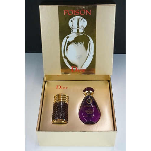 311 - A collection of Christian Dior poison to include Pure Poison, Poison and Hypnotic Poison, two bottle... 