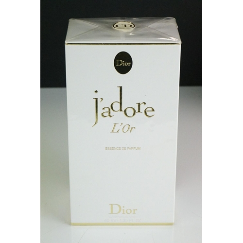 312 - A collection of Christian Dior to include J'adore L'or essence de Parfum, J'adore L'or natural spray... 