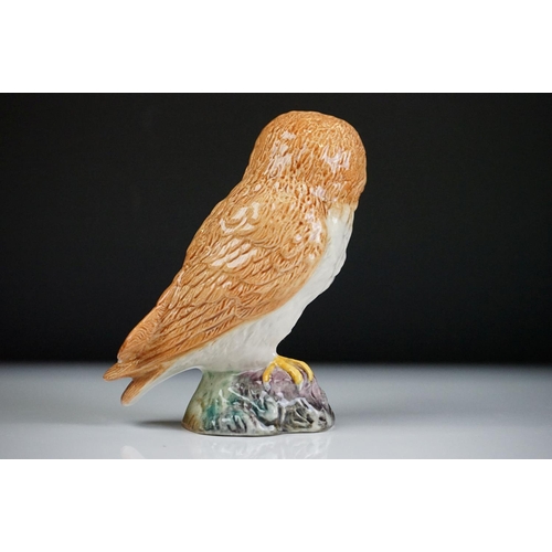 48 - Two Beswick porcelain Owl figures, the largest with impressed Beswick mark to base (no. 1046, 19cm h... 