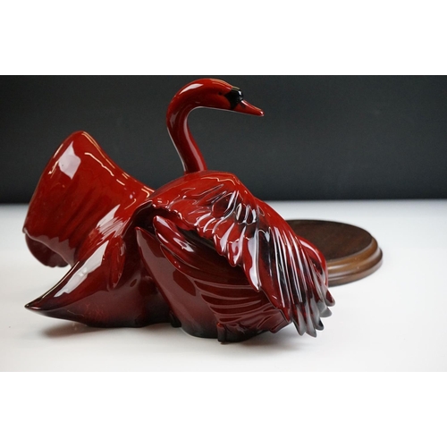 51 - Royal Doulton Flambe Images of Fire ' Nestling Down ' ceramic figure depicting a pair of swans, HN 3... 