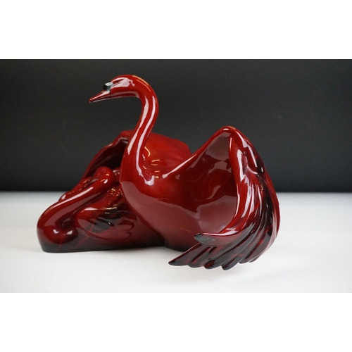 51 - Royal Doulton Flambe Images of Fire ' Nestling Down ' ceramic figure depicting a pair of swans, HN 3... 