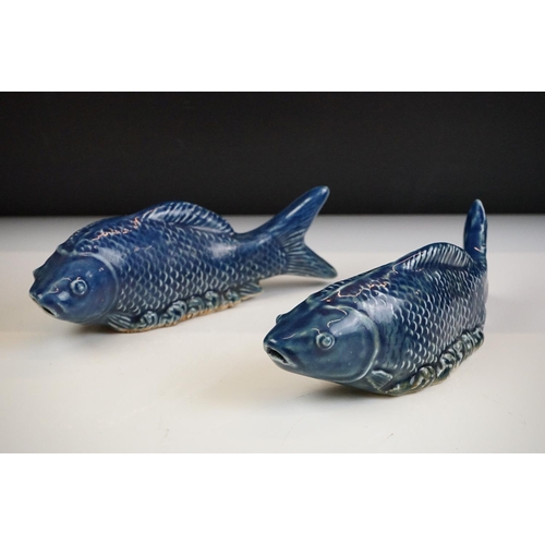 52 - Pair of Chinese Blue Glazed Koi Carp pottery figures, approx 21cm long