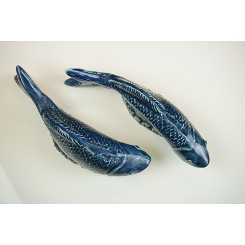 52 - Pair of Chinese Blue Glazed Koi Carp pottery figures, approx 21cm long